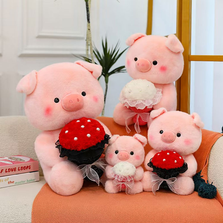 Rosa Schwein mit Blumen-Plüschtier